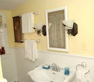 Full bath also has many hooks for hanging towles or clothes.